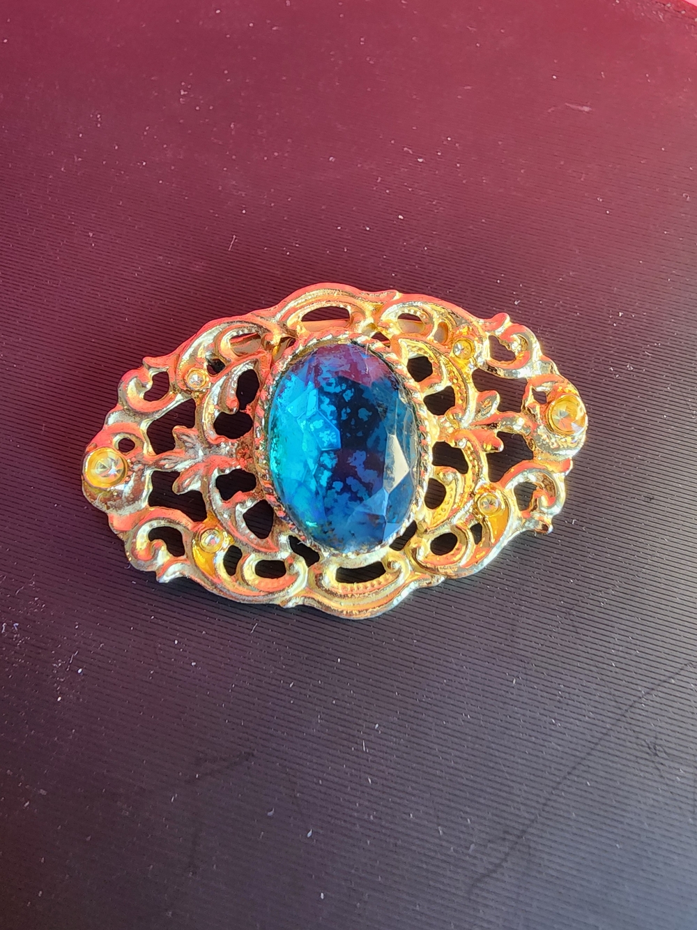 Vintage Gold Filigree Brooch with Blue Oval Stone